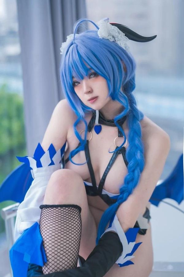 Asian cosplay teen is a sexy mystical anime bat witch posing hot